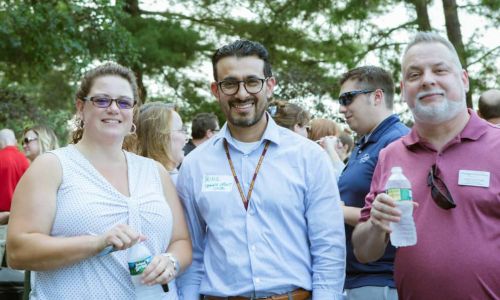 People smiling at event